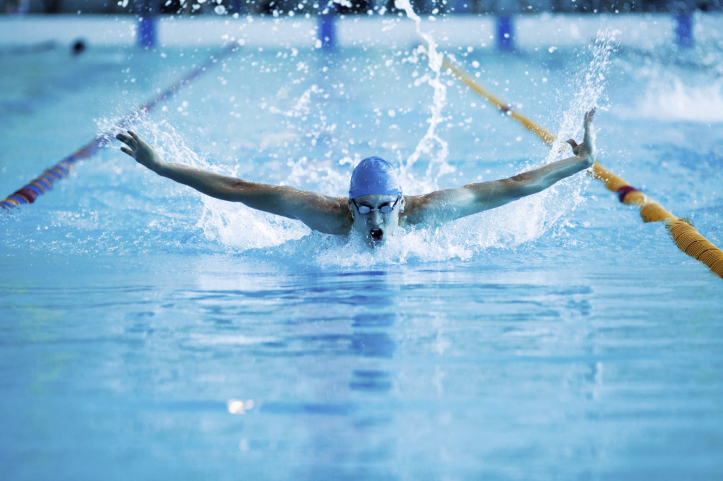 Man swims the butterfly
